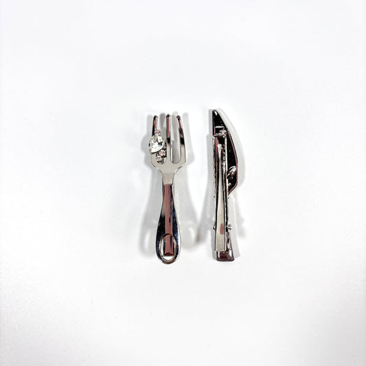 PIN SET IN KNIFE AND FORK